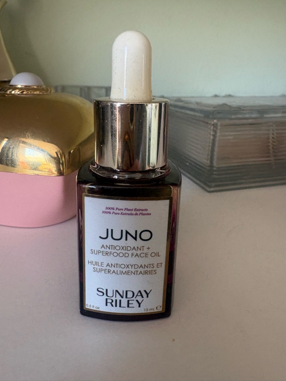 New Sunday Riley Juno Face Oil Bottle with White Dropper and Silver Cap